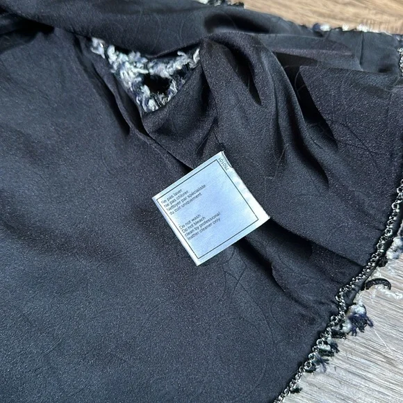 Chanel tweed + leather vest